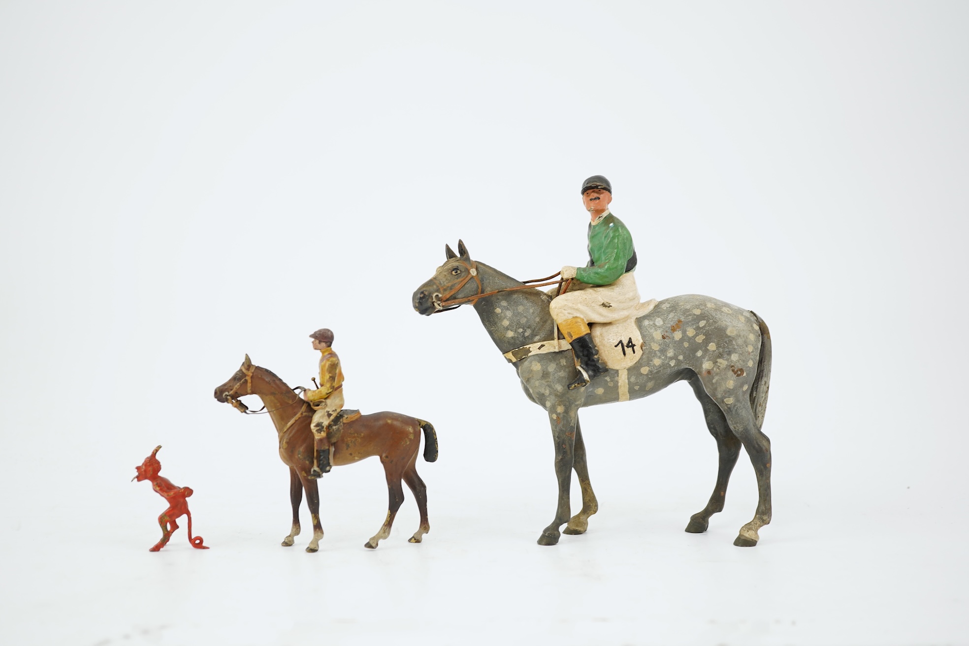 Two Austrian cold-painted bronze figures groups of jockeys on racehorses, early 20th century